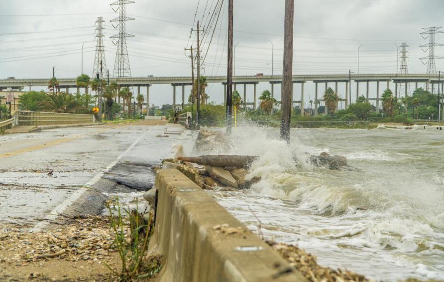 Water crashing over a road near Galveston Bay just outside of Houston Texas during Hurricane Harvey